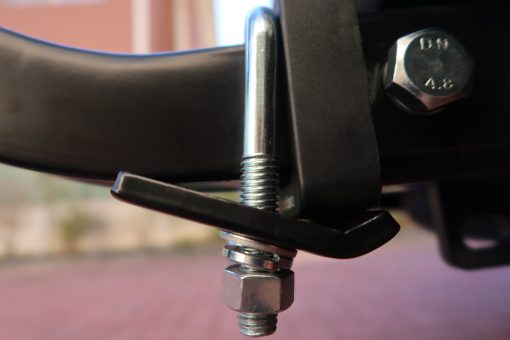 Close up side view of Anti Wobble Hitch Stabiliser attached to bike carrier and vehicle hitch